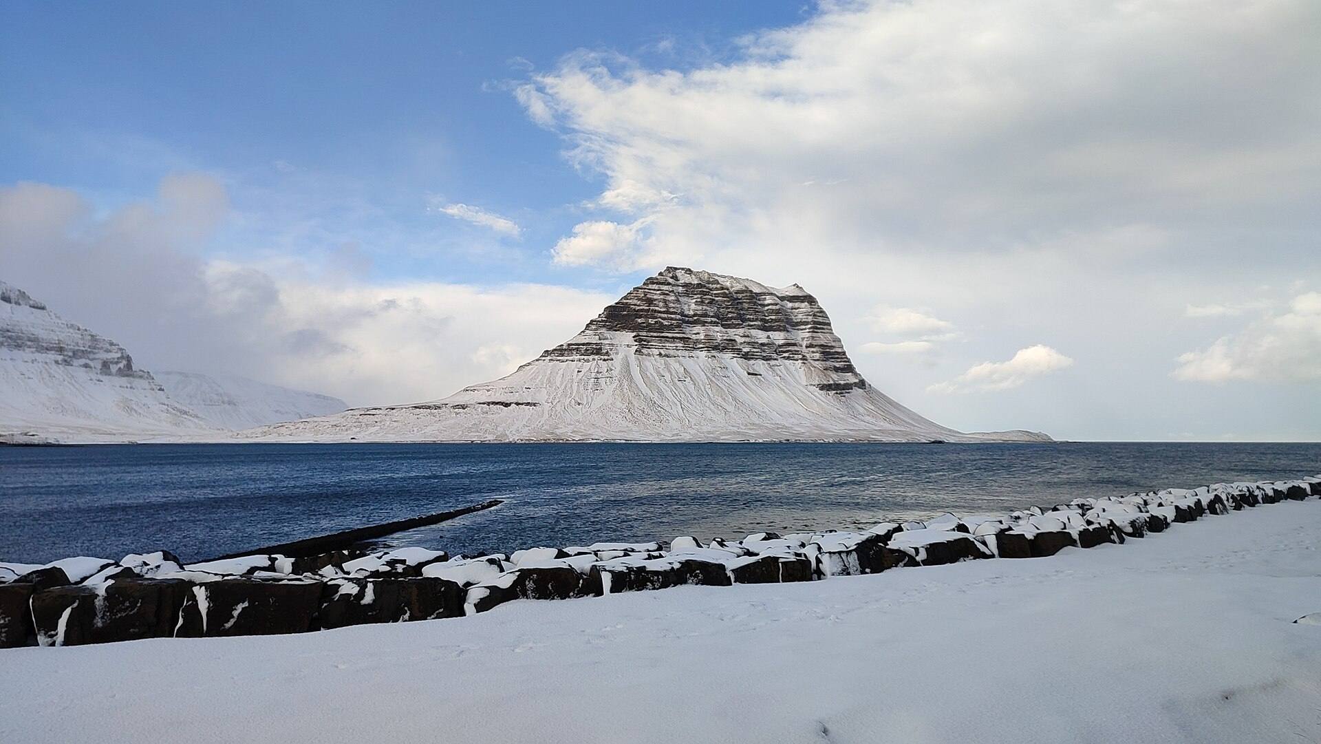Kirkjufell under snow, across the fjord